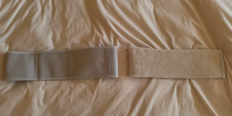 Narrow pelvic belt next to a wider soft belly band