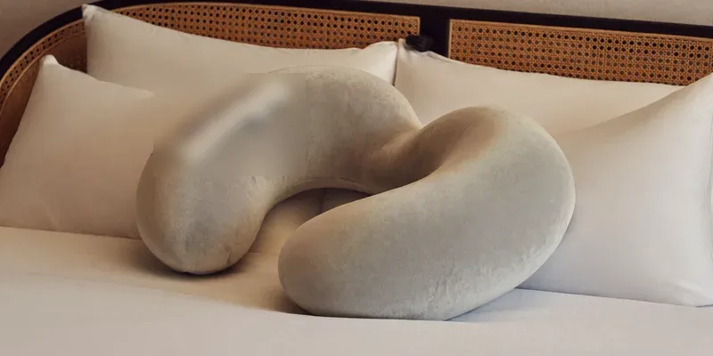 Plush light grey U-shaped pregnancy pillow