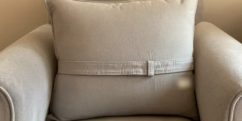 Firm flat topped nursing pillow with wrap belt
