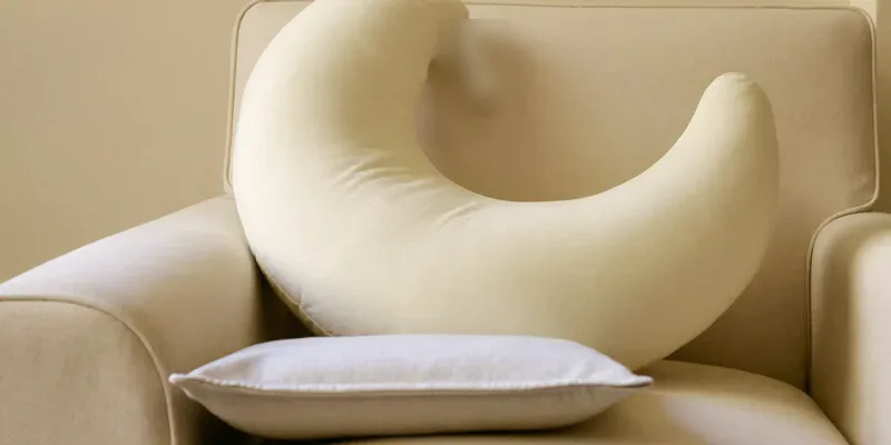 Plain crescent nursing pillow with small flat cushion