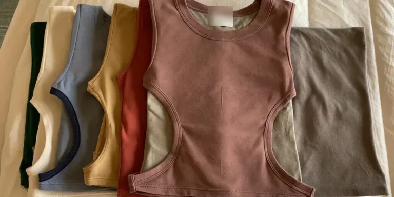 Folded jersey tops with one showing side openings