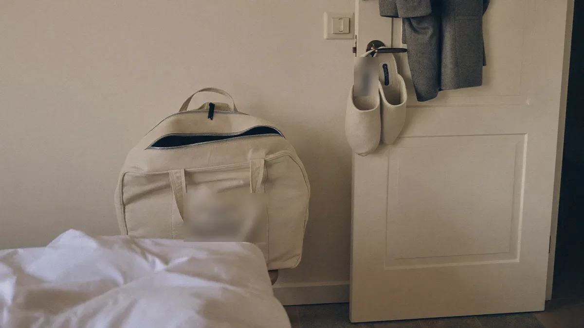 Packed weekender bag on a chair