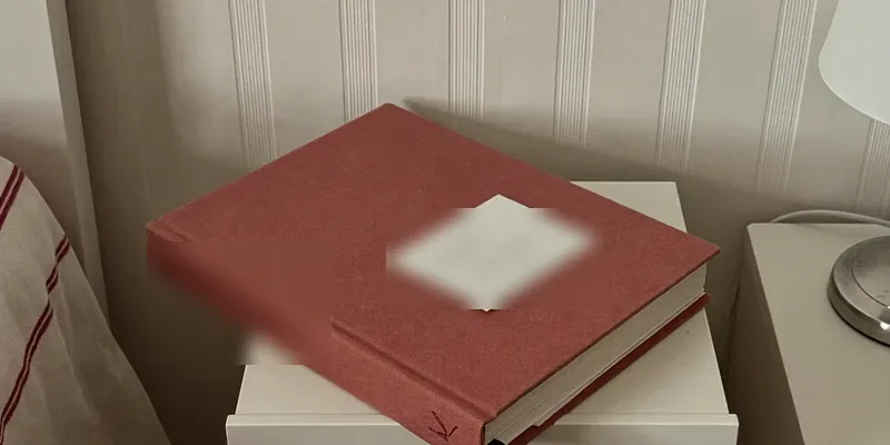 Single terracotta book with ribbon bookmark