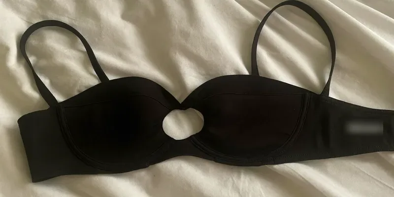 Bustier style pumping bra with round front openings